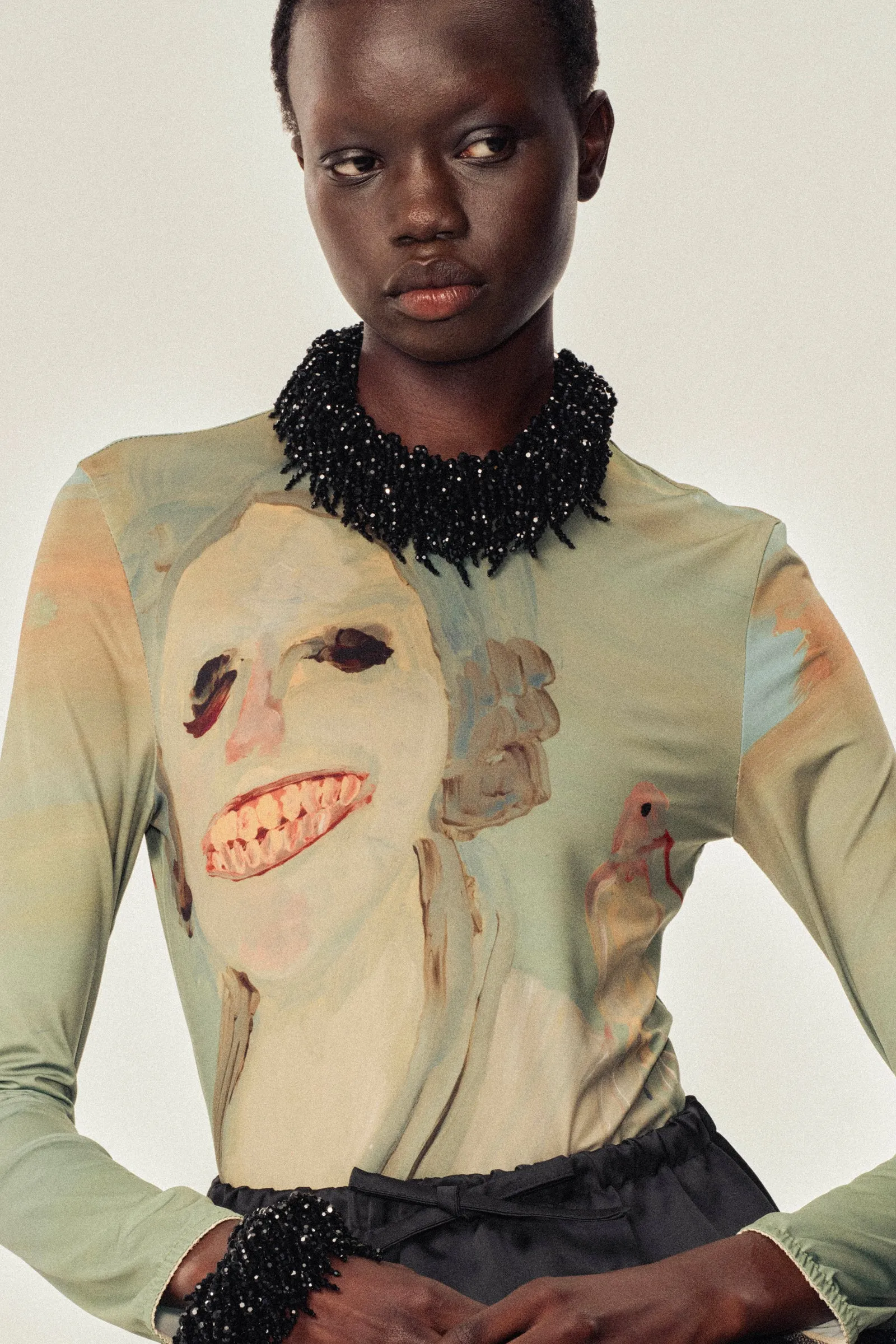 Lady With A Bird Mesh Top